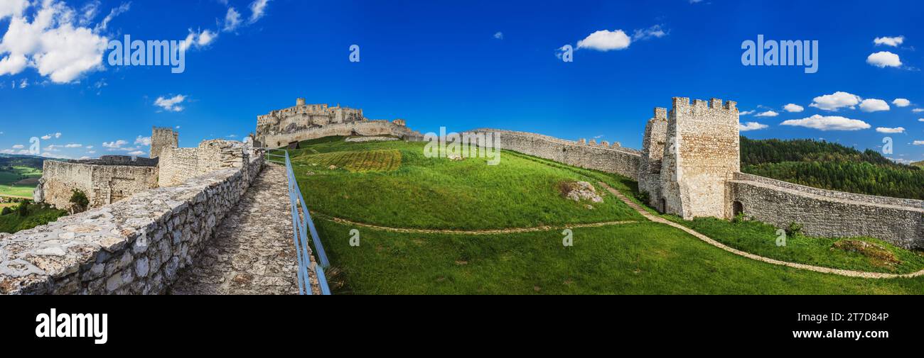 The ruins of Spis Castle (Slovak: Spissky hrad, Hungarian: Szepesi var; German: Zipser Burg) in eastern Slovakia form one of the largest castle sites Stock Photo