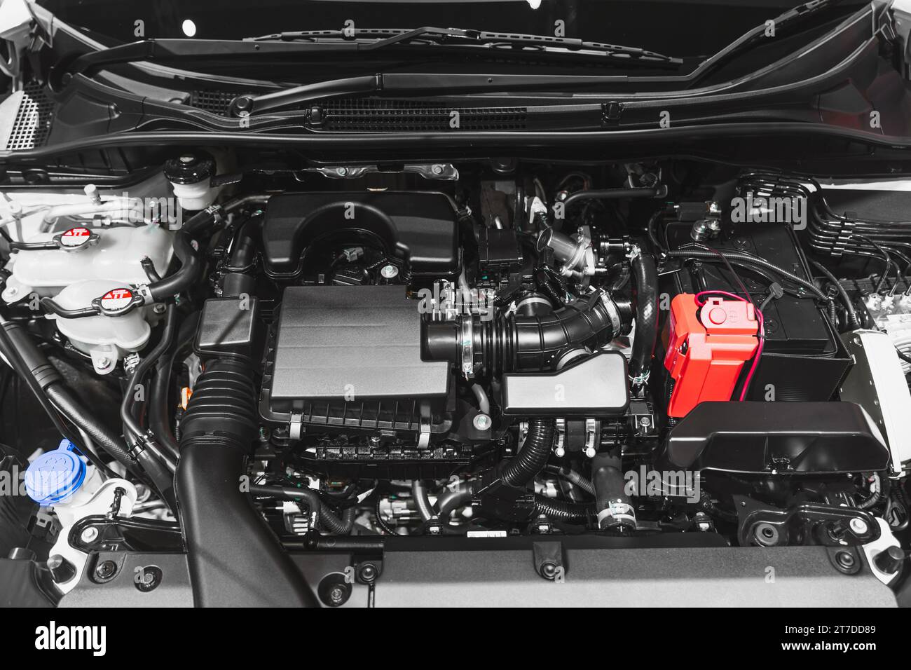 Gasoline fuel car engine underhood open front hood closeup clean new Stock Photo