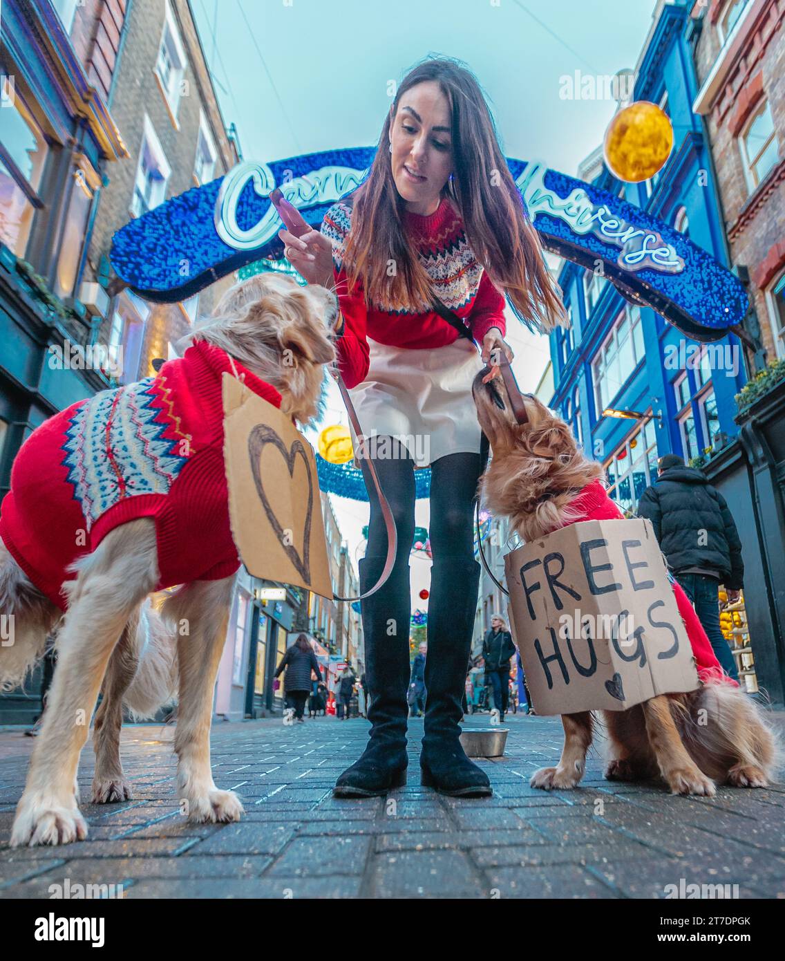 Free hugs from Ursula Aitchison with Huxley and Hugo on Carnaby Street