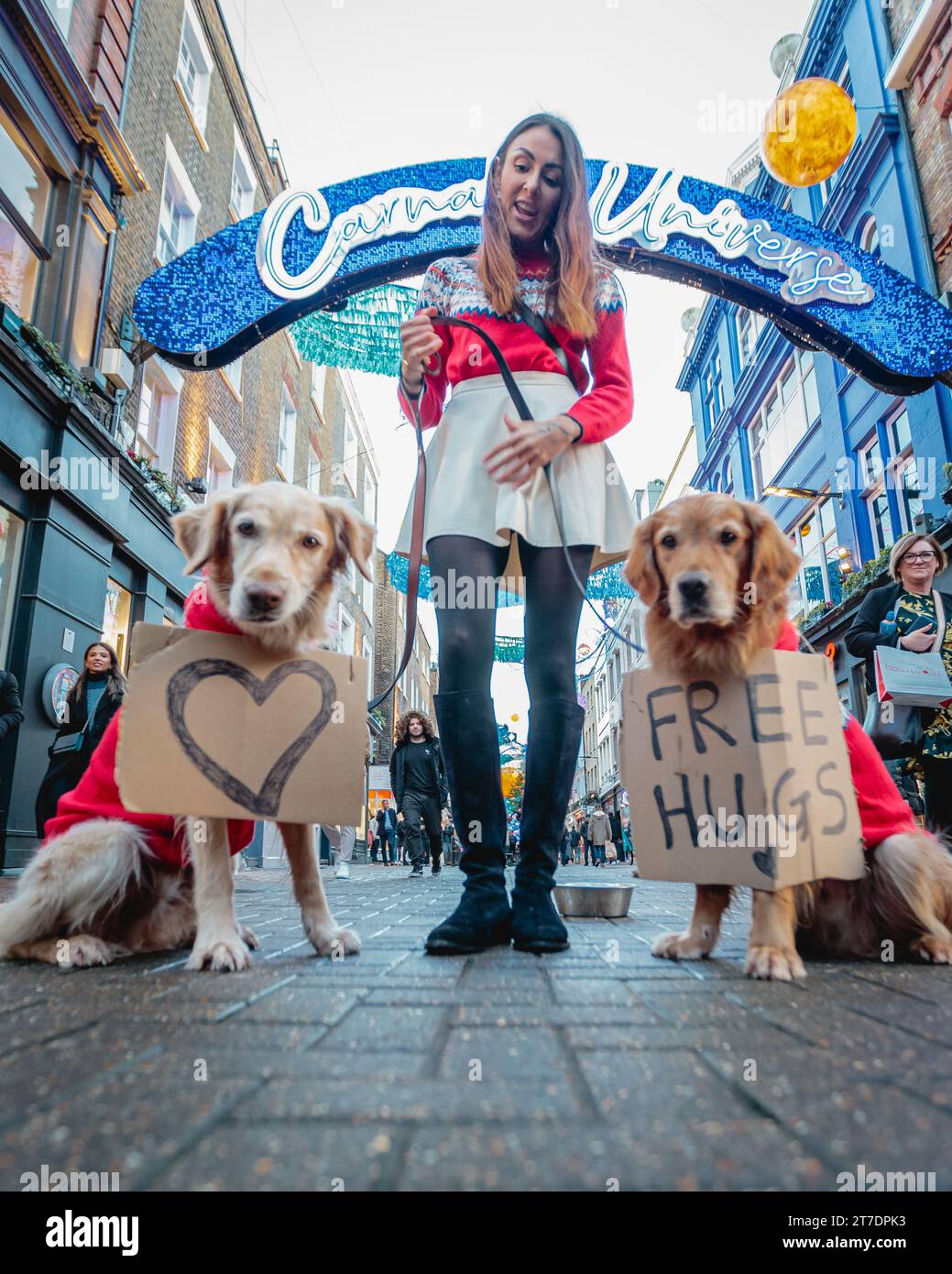 Ursula Aitchison with her golden boys, Huxley and Hugo on Carnaby Street in London. Stock Photo