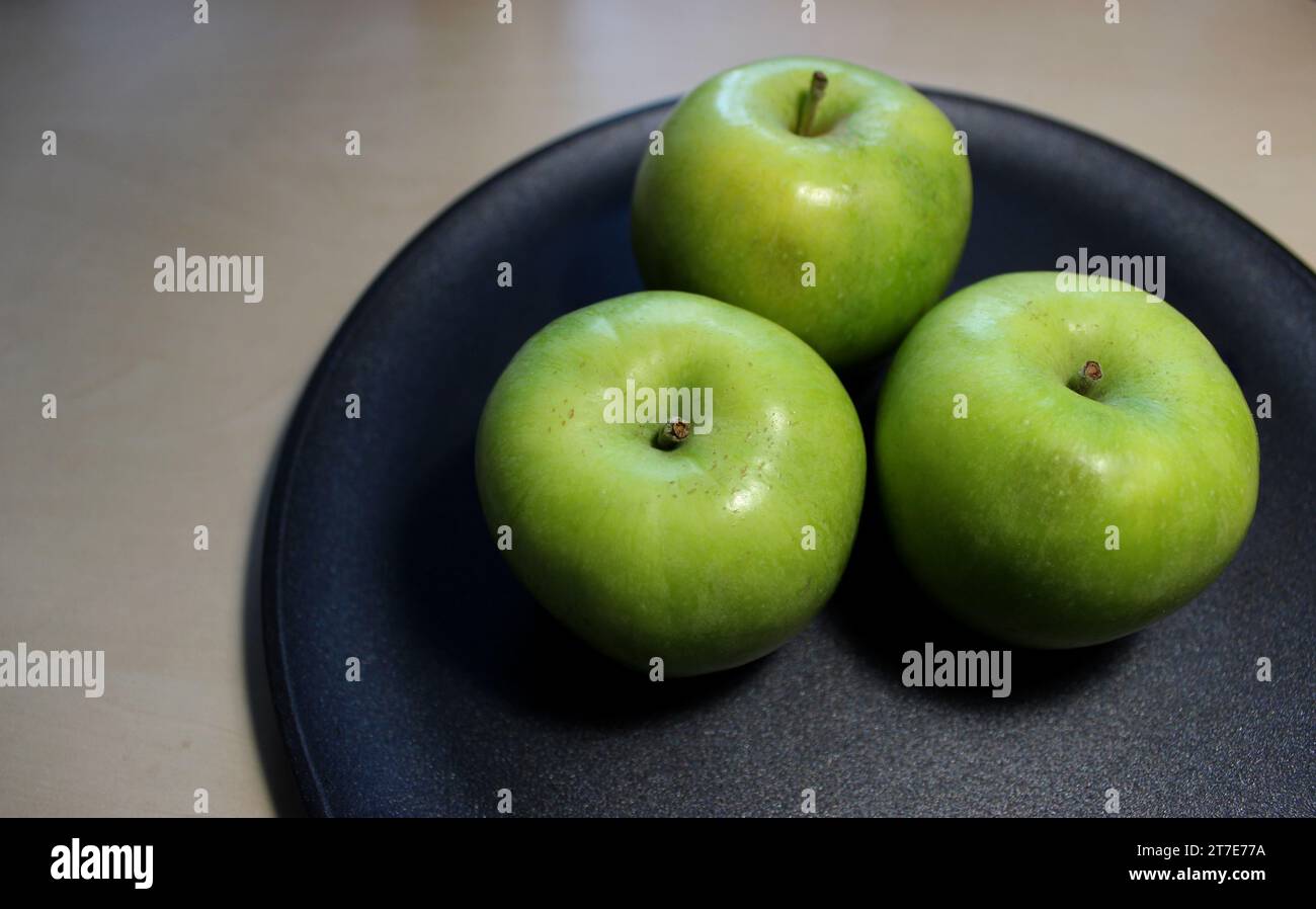 Green Apples On A Ceramic Pan Surface Preparing To Heat Treatment Stock Photo Stock Photo