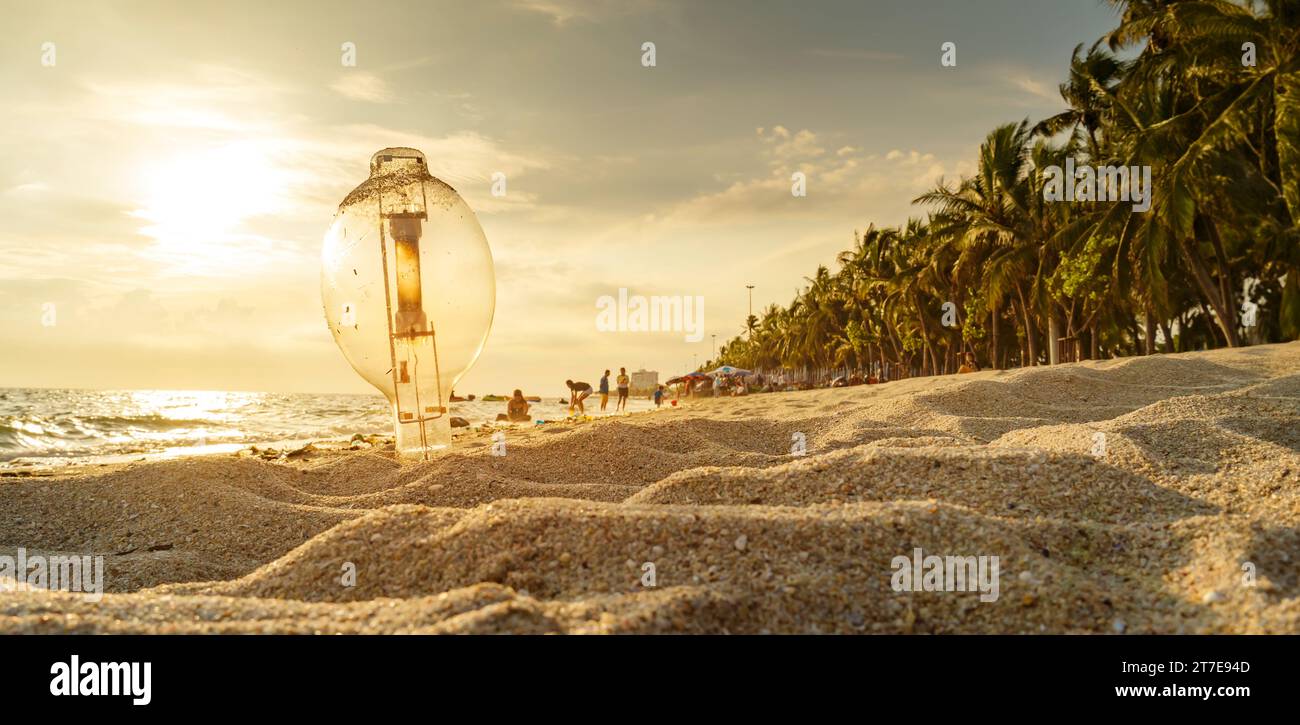 A large garbage lamp on the beach. Pollution and Marine Environment Problems Stock Photo
