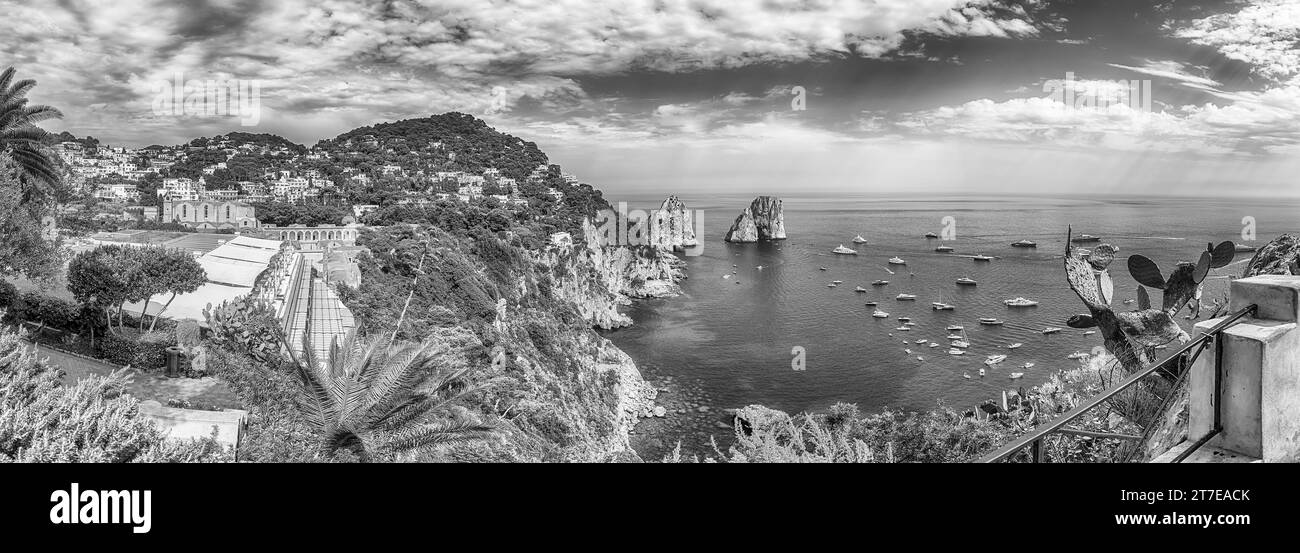 Panoramic view over Marina Piccola and Faraglioni: coastal wonders in Mediterranean splendor of the island of Capri, Italy Stock Photo
