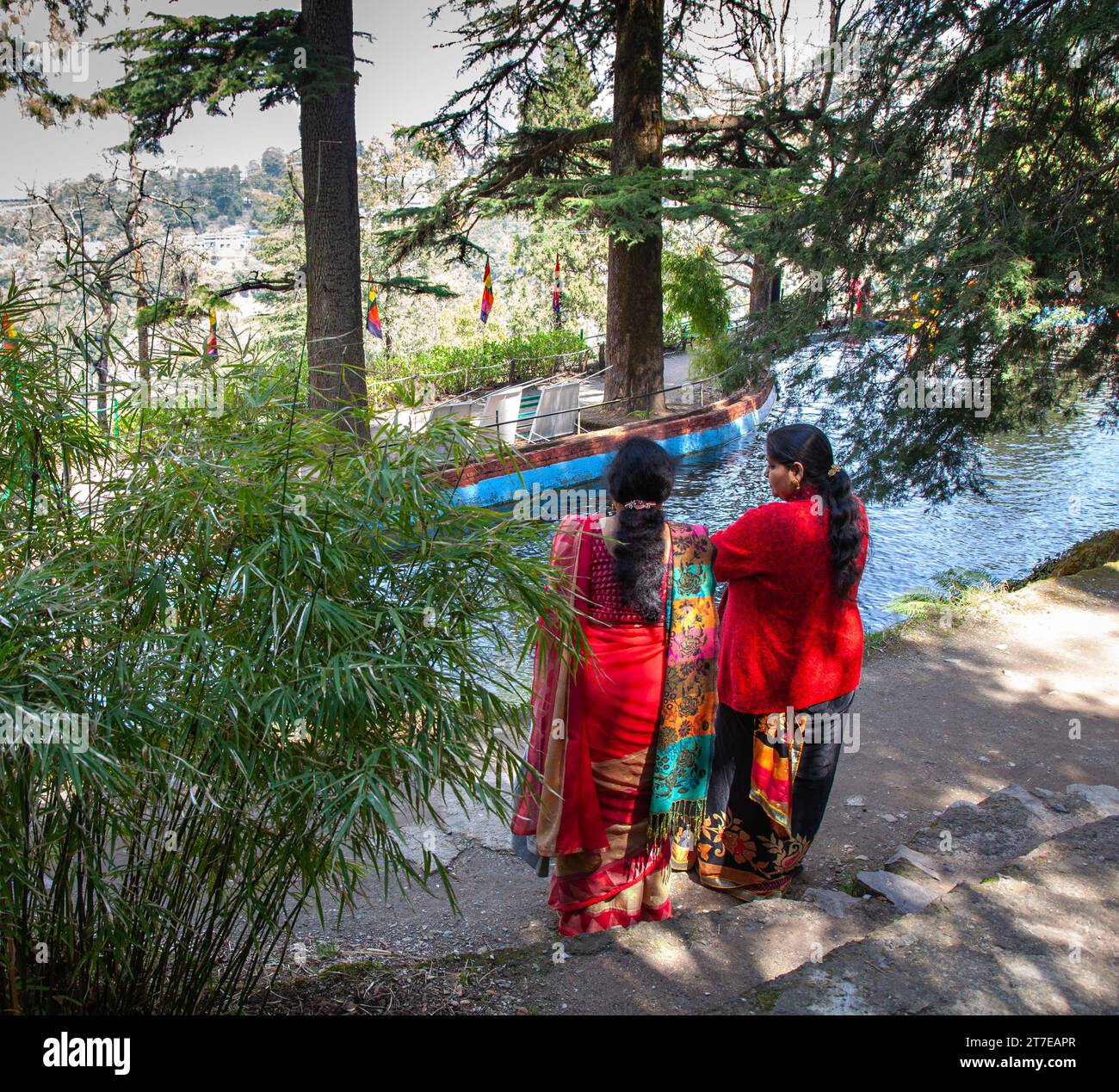 Two Indian women on the river bank in Company Garden, Mussoorie Stock Photo