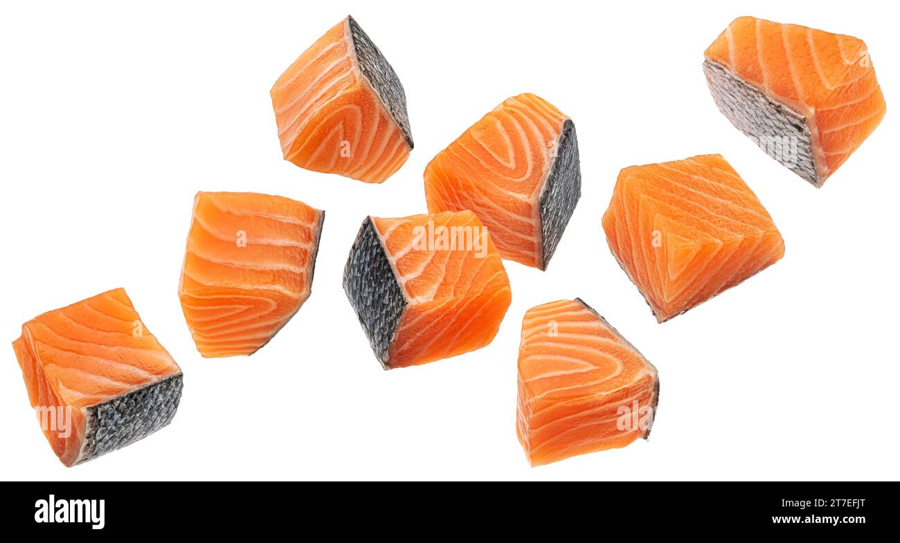 Salmon fillet cubes isolated on white background with clipping path Stock Photo