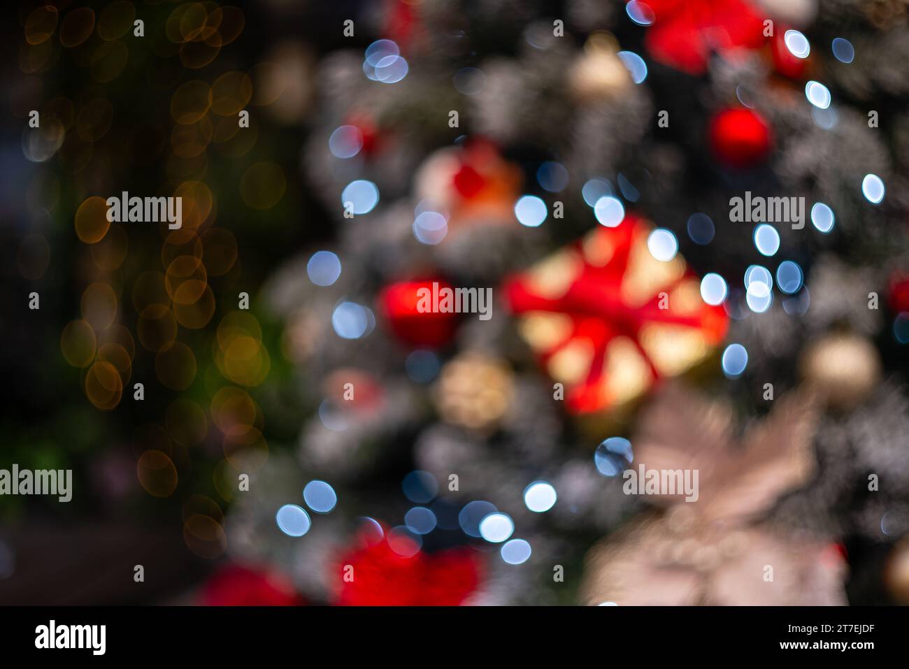 Blurred holiday background with bokeh. Defocused New Year and Christmas ...