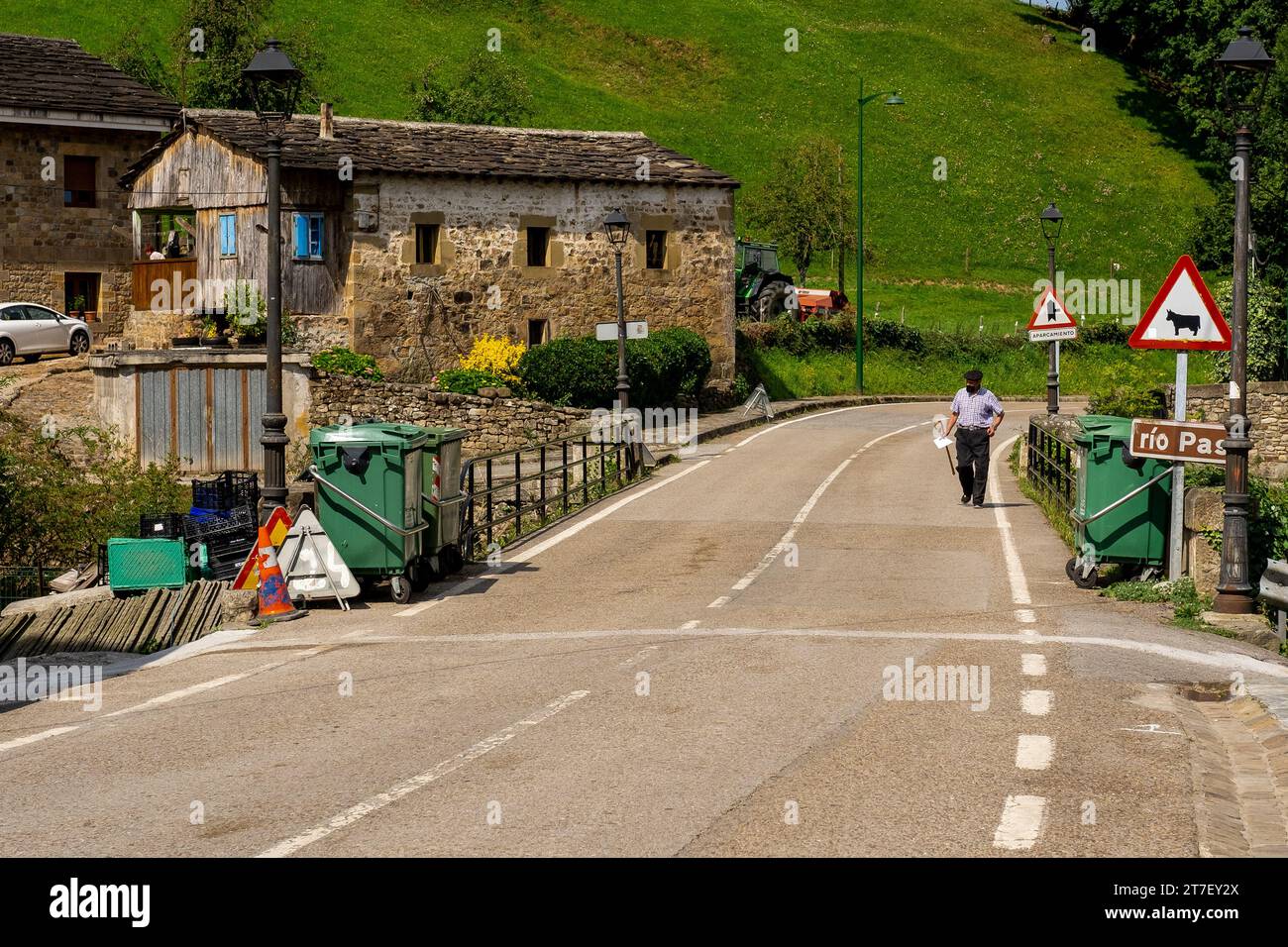 Wandering Through Time: Elderly Gentleman in Rural Attire Strolling Along the Historic Pas Valley, Cantabria, Spain Stock Photo
