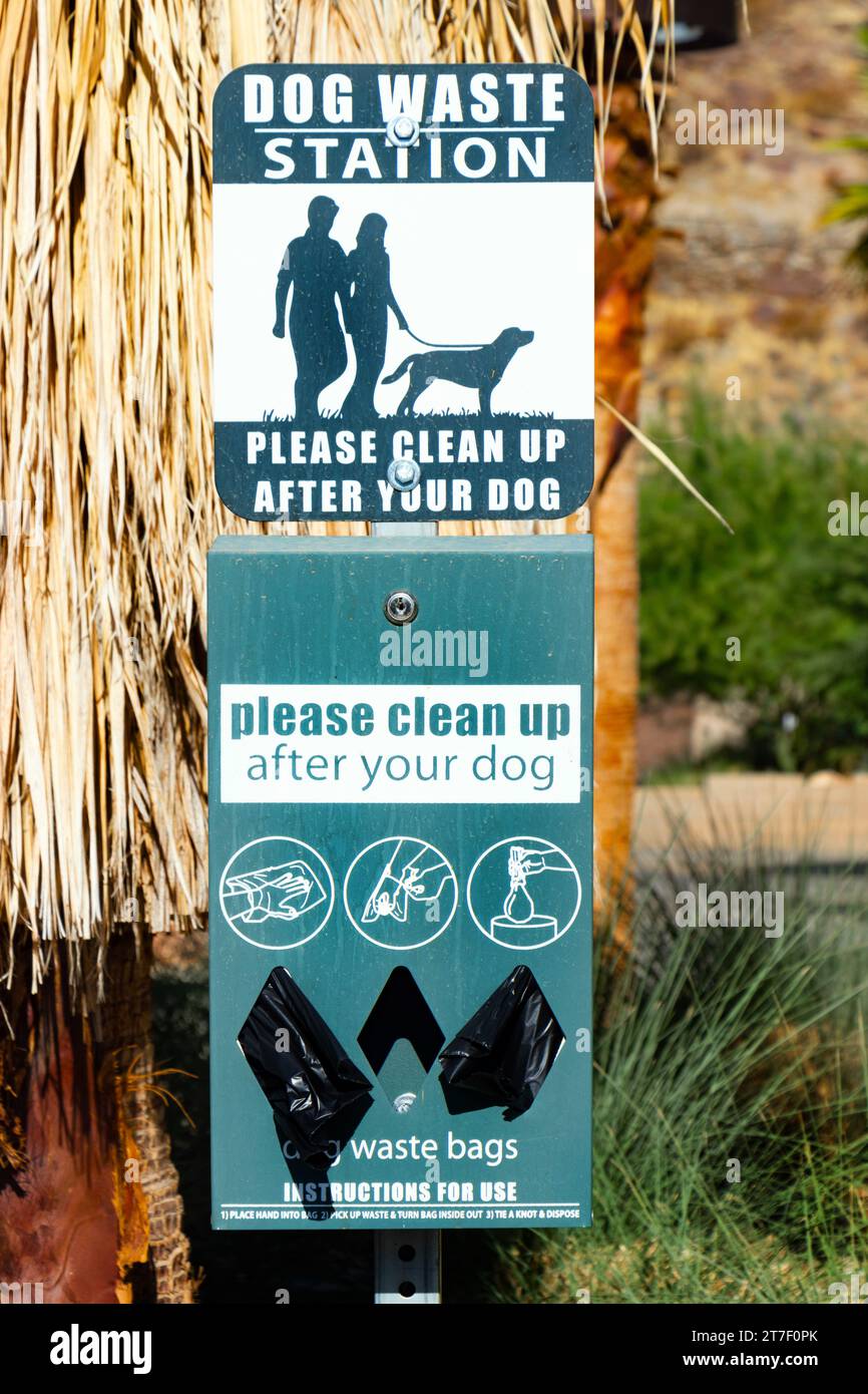 street sign for DOG WASTE STATION in Los angeles california PLEASE CLEAN UP AFTER YOUR DOG waste