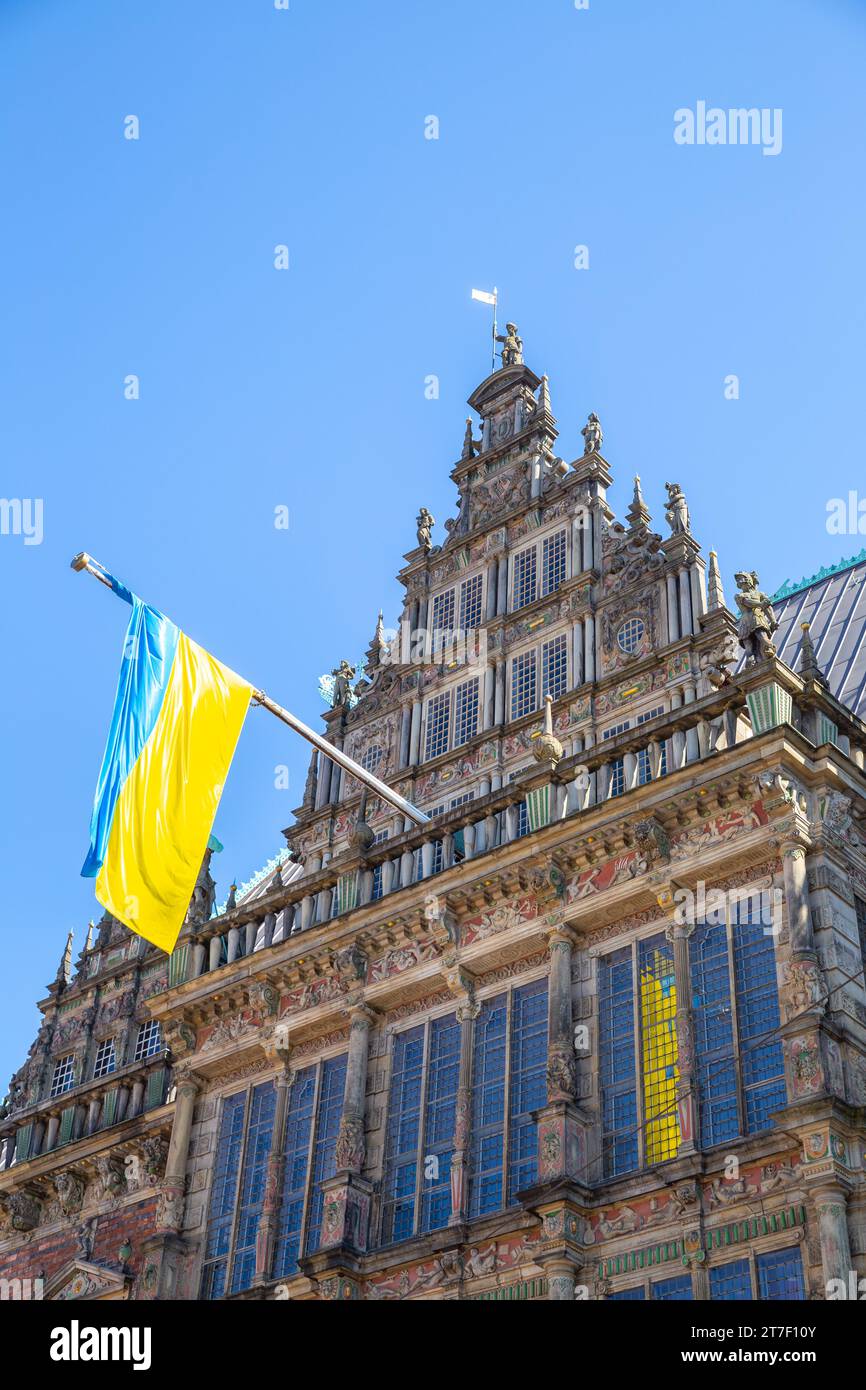 Ukraine flag flown over the history building in the centre of Bremen, Germany Stock Photo