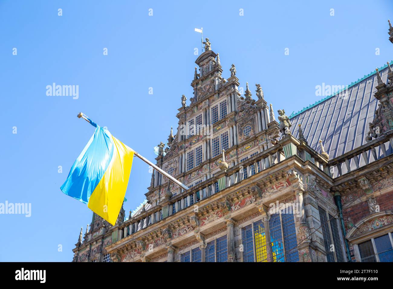 Ukraine flag flown over the history building in the centre of Bremen, Germany Stock Photo