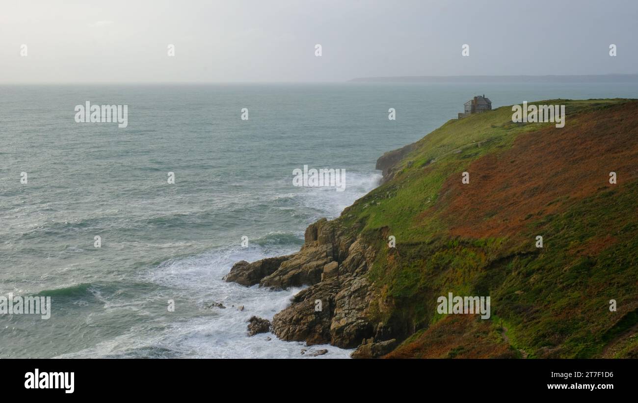 Exposed, isolated property on Rinsey Head, Cornwall, UK - John Gollop Stock Photo