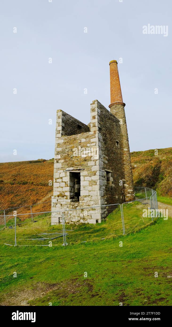 The Wheal Prosper engine house at Rinsey near Helston, Cornwall UK. The building has been fenced off due to subsidence - John Gollop Stock Photo