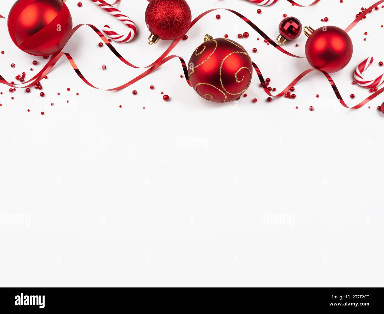 christmas frame with red balls on white background Stock Photo - Alamy