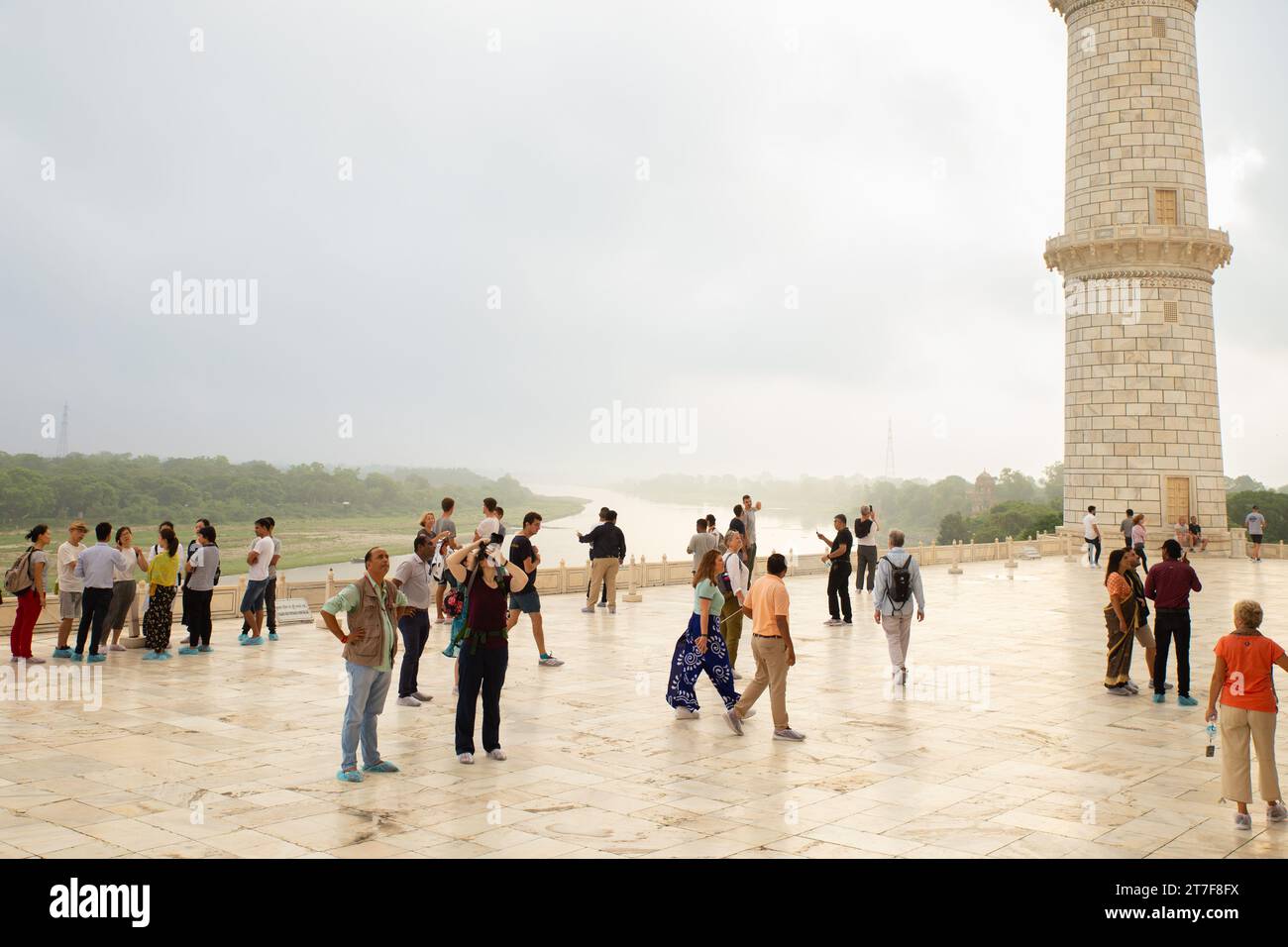 Taj Mahal, India–July 03,2019:tourists watching Yamuna river in a cloudy day Stock Photo