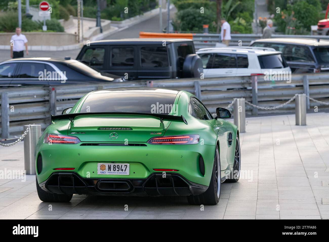 Monte Carlo, Monaco - Matte Green Hell Magno Mercedes-AMG GT R driving on the on Casino Square. Stock Photo