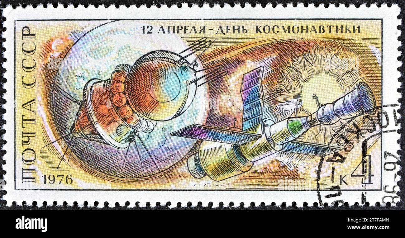 Cancelled postage stamp printed by USSR, that shows 'Vostok', 'Salyut' and 'Soyuz' Spacecraft, 15th Anniversary of First Manned Space Flight Stock Photo