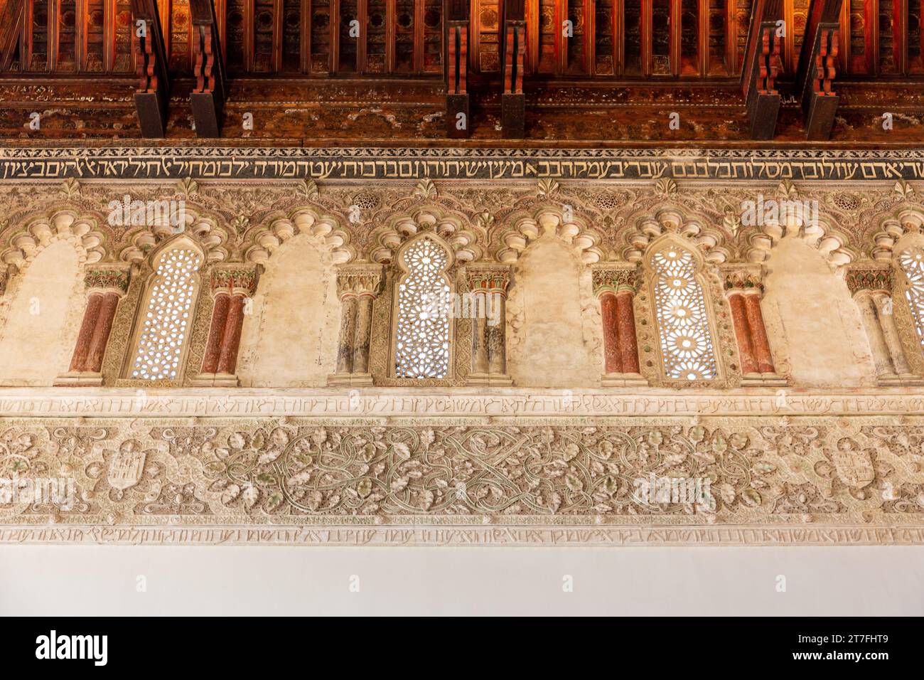 Toledo, Spain, 08.10.21. Rich Mudejar, Nasrid-style polychrome stucco decorations, arches, floral patterns in the Synagogue of El Transito. Stock Photo