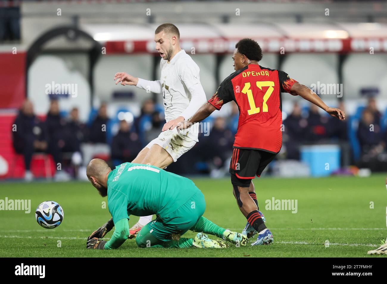 Leuevn, Belgium. 15th Nov, 2023. Serbian goalkeeper Predrag Rajkovic and Belgium's Lois Openda fight for the ball during a friendly game between Belgian national soccer team Red Devils and Serbia, Wednesday 15 November 2023, at The King Power At Den Dreef Stadium in Leuven. The location changed yesterday because the field of the King Baudouin stadium in Brussels was flooded. BELGA PHOTO BRUNO FAHY Credit: Belga News Agency/Alamy Live News Stock Photo