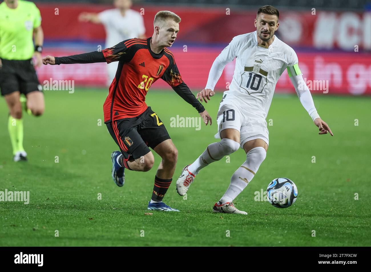 Leuevn, Belgium. 15th Nov, 2023. Belgium's Arthur Vermeeren and Serbian Dusan Tadic fight for the ball during a friendly game between Belgian national soccer team Red Devils and Serbia, Wednesday 15 November 2023, at The King Power At Den Dreef Stadium in Leuven. The location changed yesterday because the field of the King Baudouin stadium in Brussels was flooded. BELGA PHOTO BRUNO FAHY Credit: Belga News Agency/Alamy Live News Stock Photo