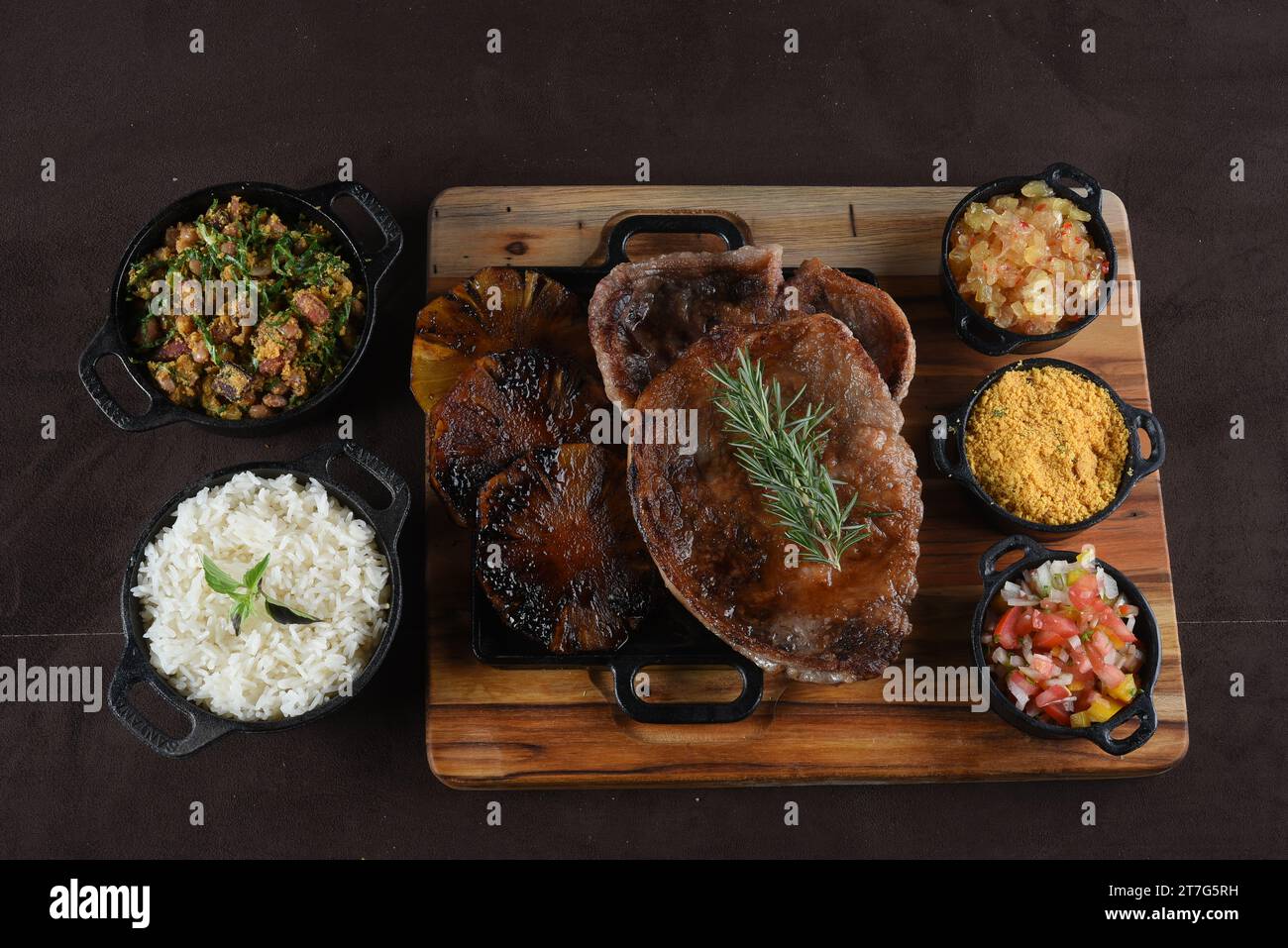 Grilled Chuck Eye Roll Steak roasted on a chopping board. bbq barbecue