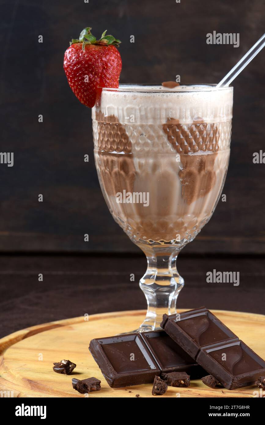 chocolate drink with milk and alcoholic amarula with strawberry Stock Photo Alamy