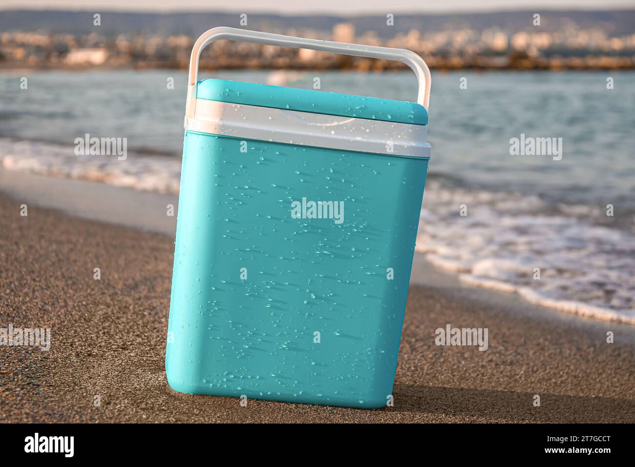 Modern beach cooler on sea shore Stock Photo - Alamy