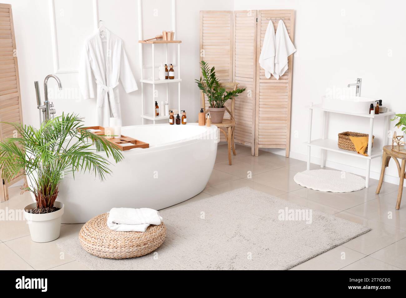 Interior of bathroom with bathtub and accessories Stock Photo