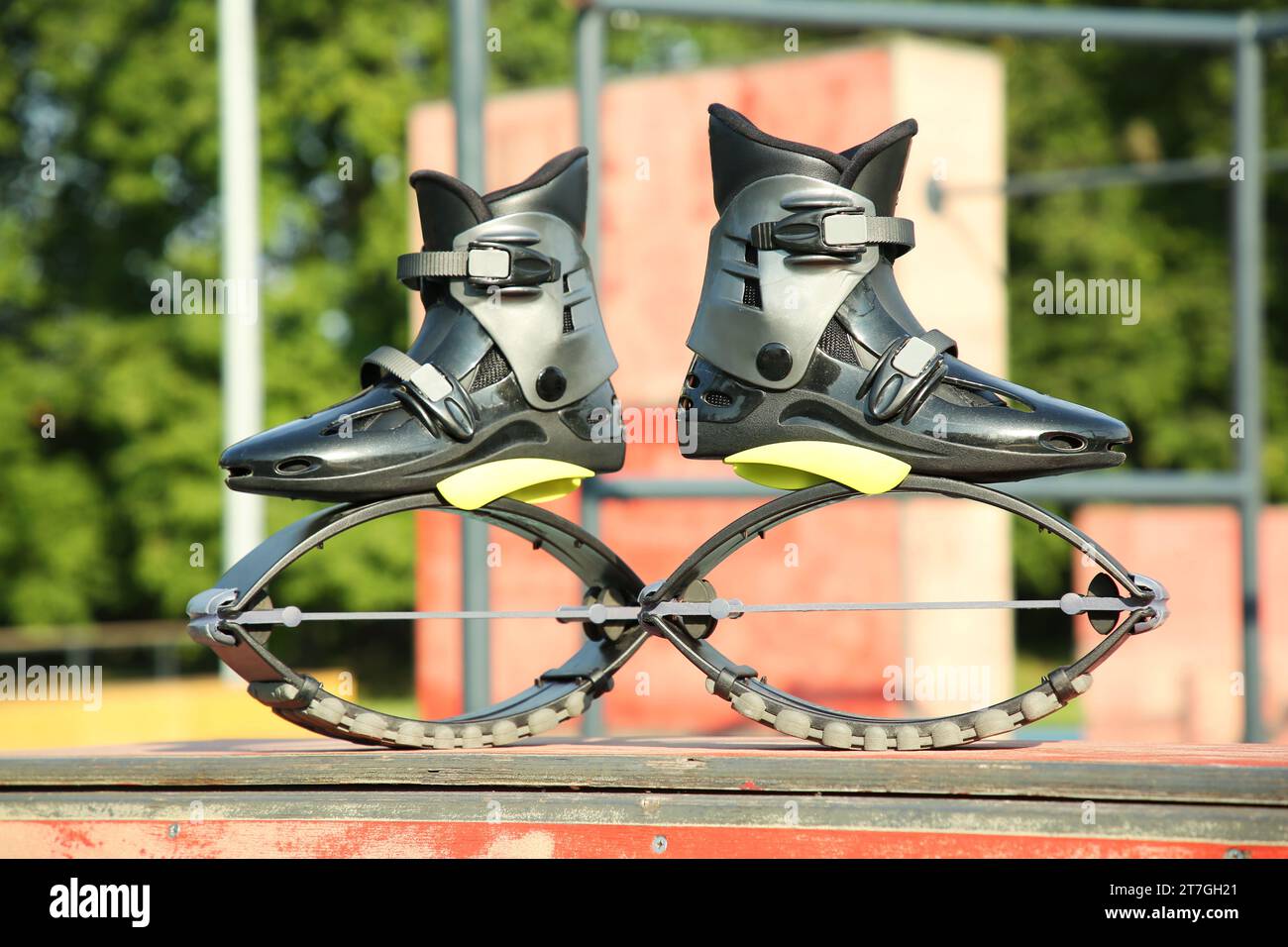 Stylish kangoo jumping boots in workout park Stock Photo Alamy