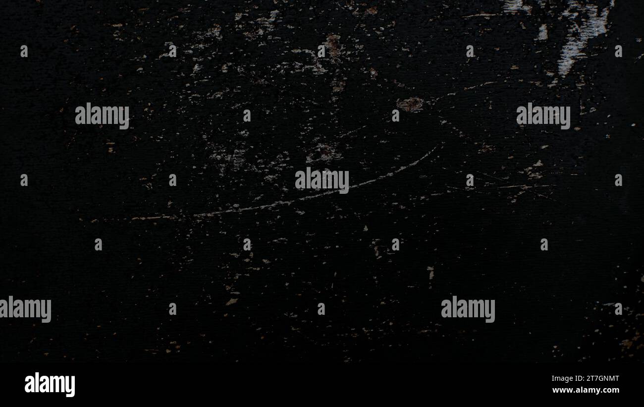 scratched black wall texture, black grunge background. Stock Photo