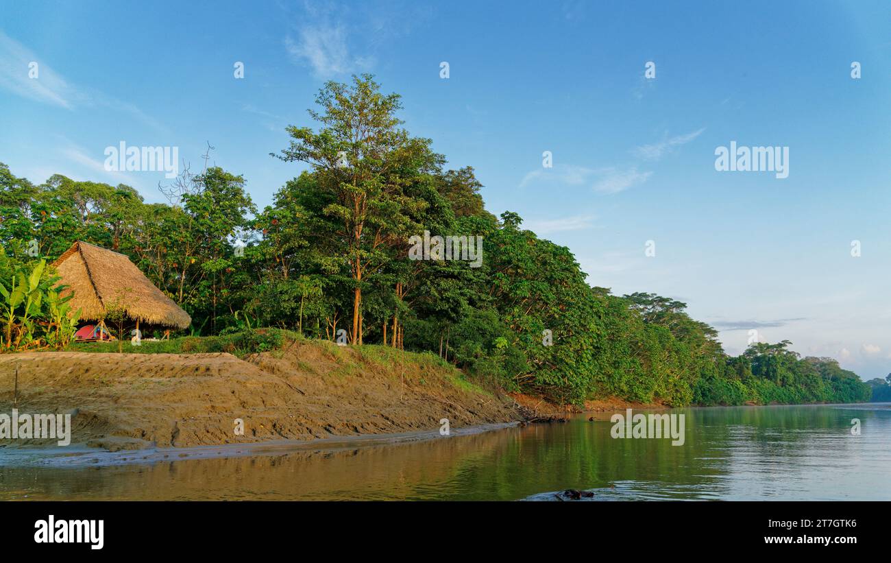 A community campsite in the Amazonian rainforest, Cuyabeno Reserve in the Amazon Region between Ecuador and Peru. Stock Photo