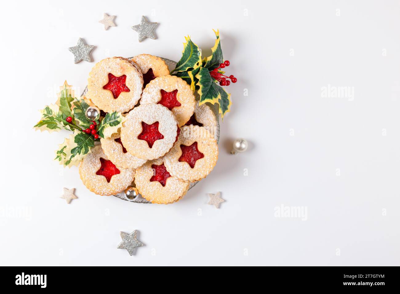 Glass plate with biscuits, Christmas biscuits, Christmas decoration, white background, copy room Stock Photo