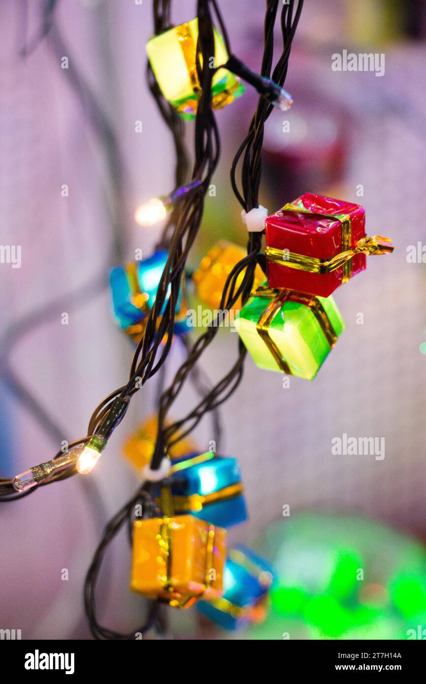 Christmas and party lights in the form of colorful gift boxes Stock Photo