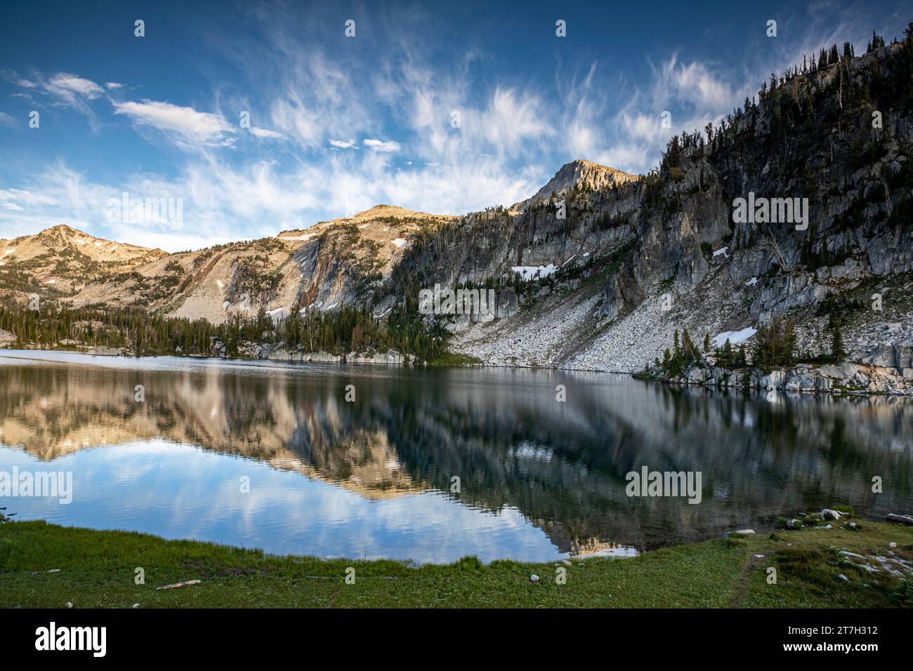 OR02727-00...OREGON - Clouds over Eagle Cap reflecting in the late afternoon in Mirror Lake; Eagle Cap Wilderness area. Stock Photo