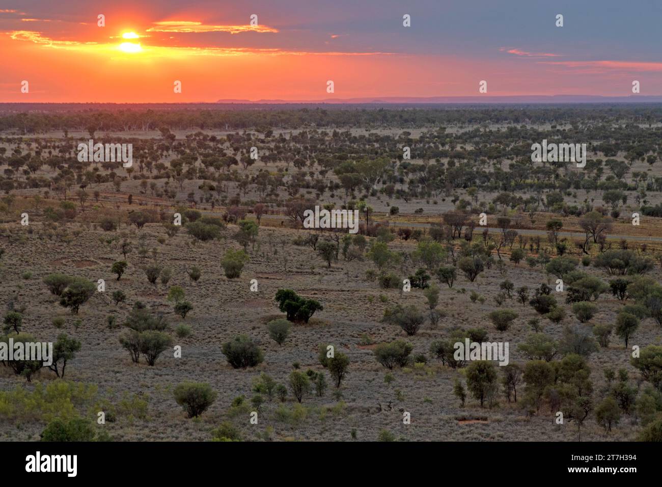 Sunrise over the desert south of Alice Springs Stock Photo