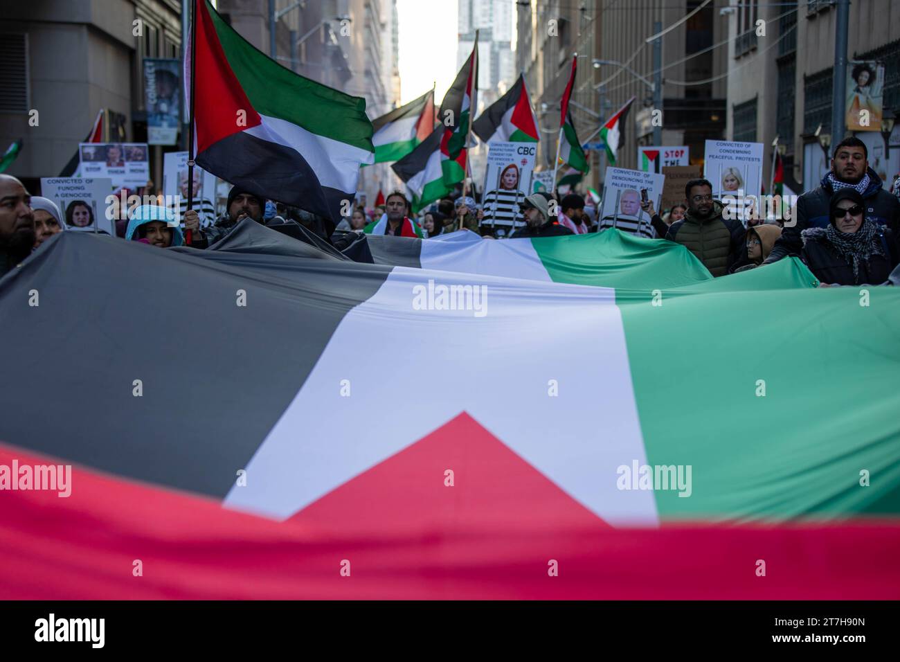 thousands of pro-Palestinian march the streets of Toronto, demanding a ceasefire in Gaza. Stock Photo