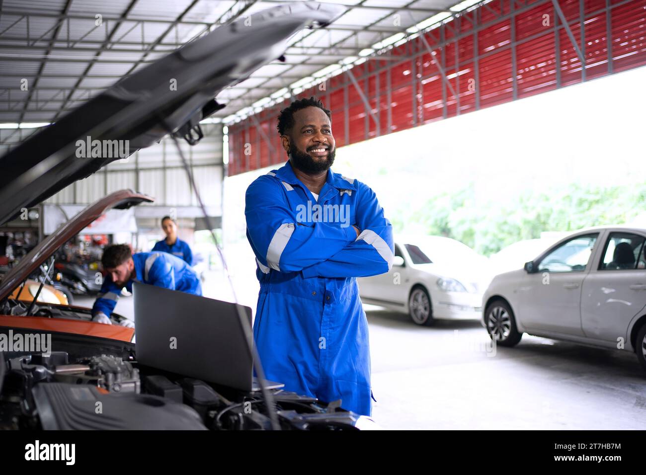 Mechanic work at auto repair shop. Small business and engineering concept. Stock Photo