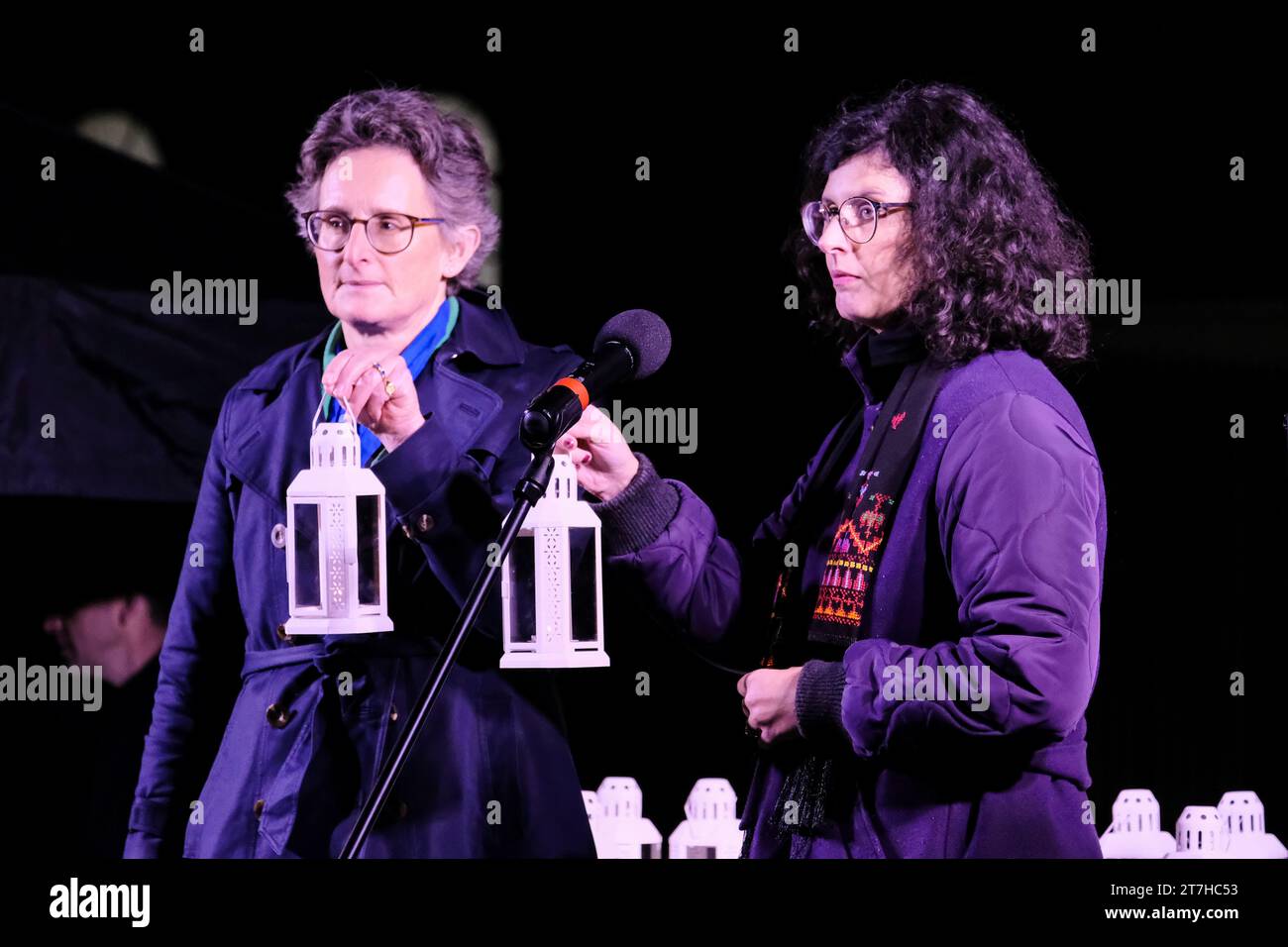 London, UK. 15th November. MPs Flick Drummond and Layla Moran light lanterns in a gesture of peace. Members of the public, MPs, Faith and community leaders took part in the Humanity Not Hatred event opposite Downing Street, to remember all victims of the Israel-Hamas conflict. Credit: Eleventh Hour Photography/Alamy Live News Stock Photo