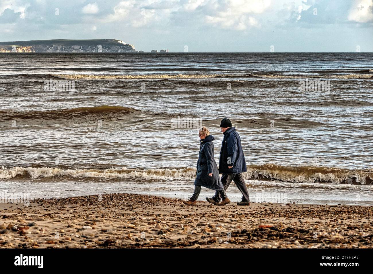 Walking on Avon Beach Mudeford Dorset UK Stock Photo