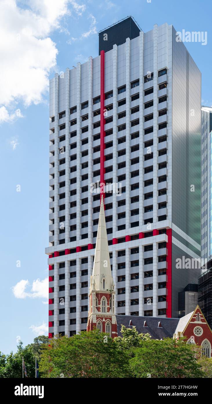 Albert Street Uniting Church contrasting the old and the new in the modern cityscape in the centre of Brisbane. Stock Photo