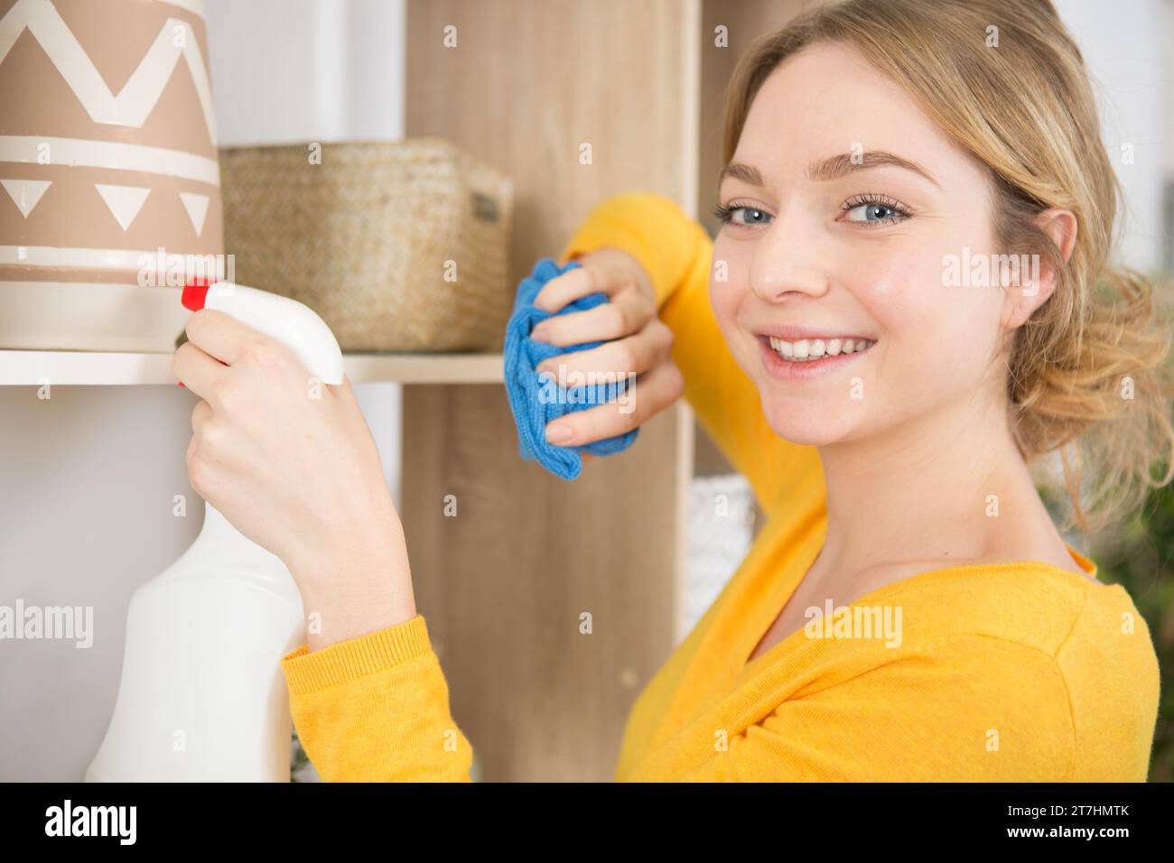 Woman dusting window hi-res stock photography and images - Alamy