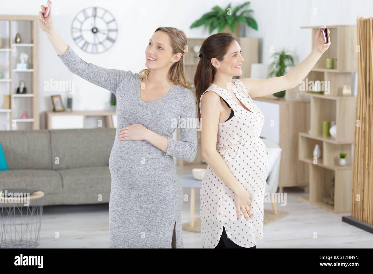 two pregant women taking a selfie Stock Photo