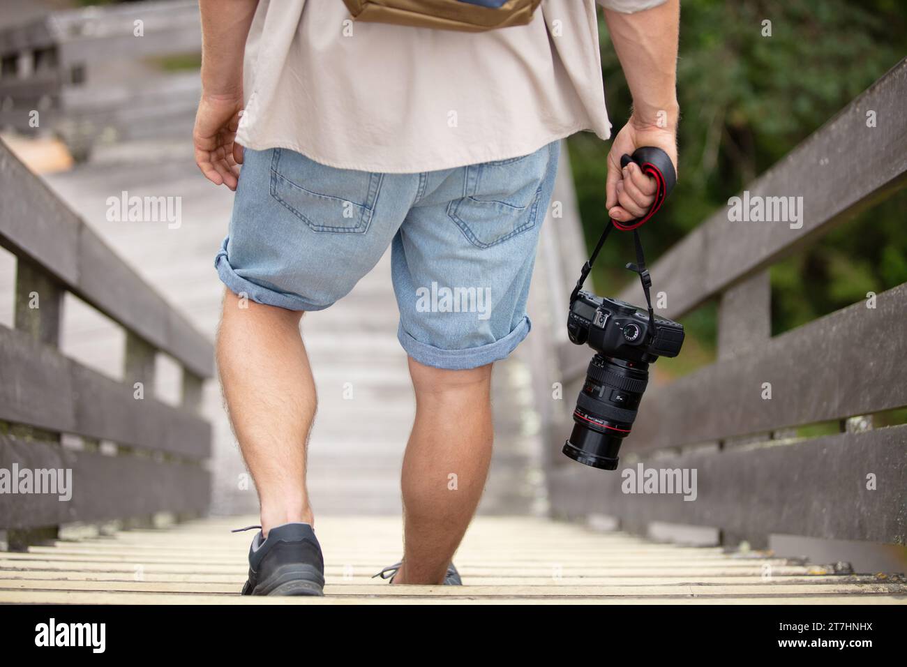 photographer is walking down the steps Stock Photo - Alamy