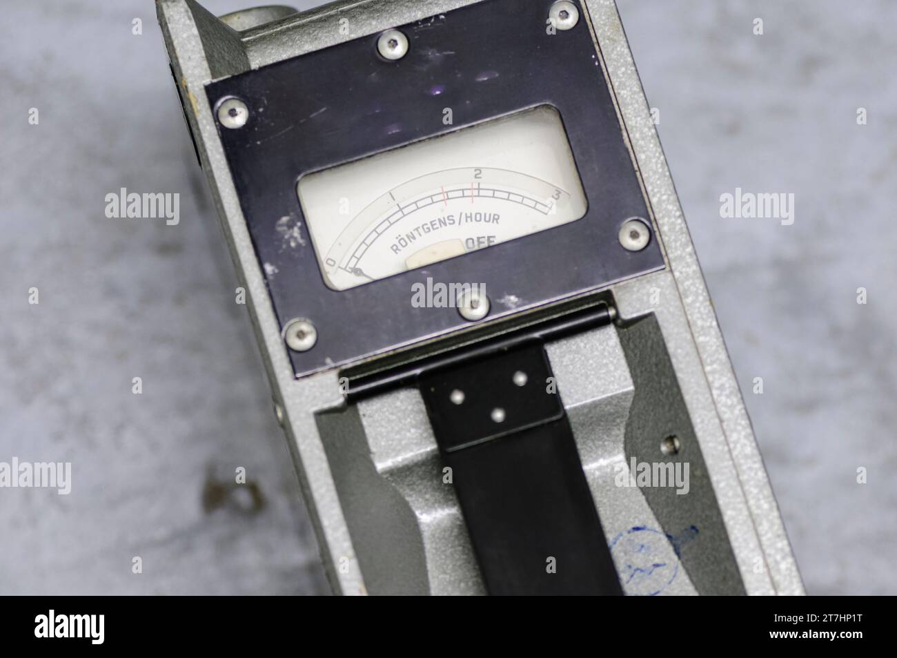 Military geiger counter showing a scale of 0 to 3 Rontgens per hour. Stock Photo