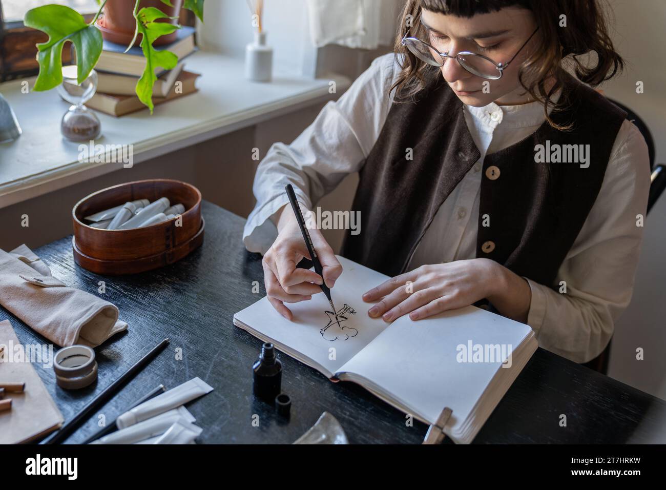 Animated cartoon artist, painter, drawing tutor sketching animation