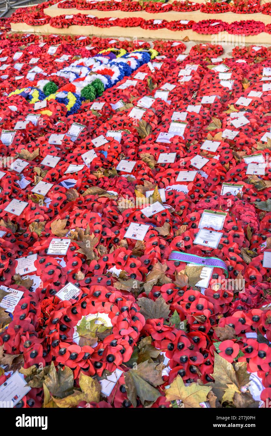 London, UK. Poppy wreaths left at the Cenotaph in Whitehall after the Rememberance Sunday ceremony, November 2023 Stock Photo