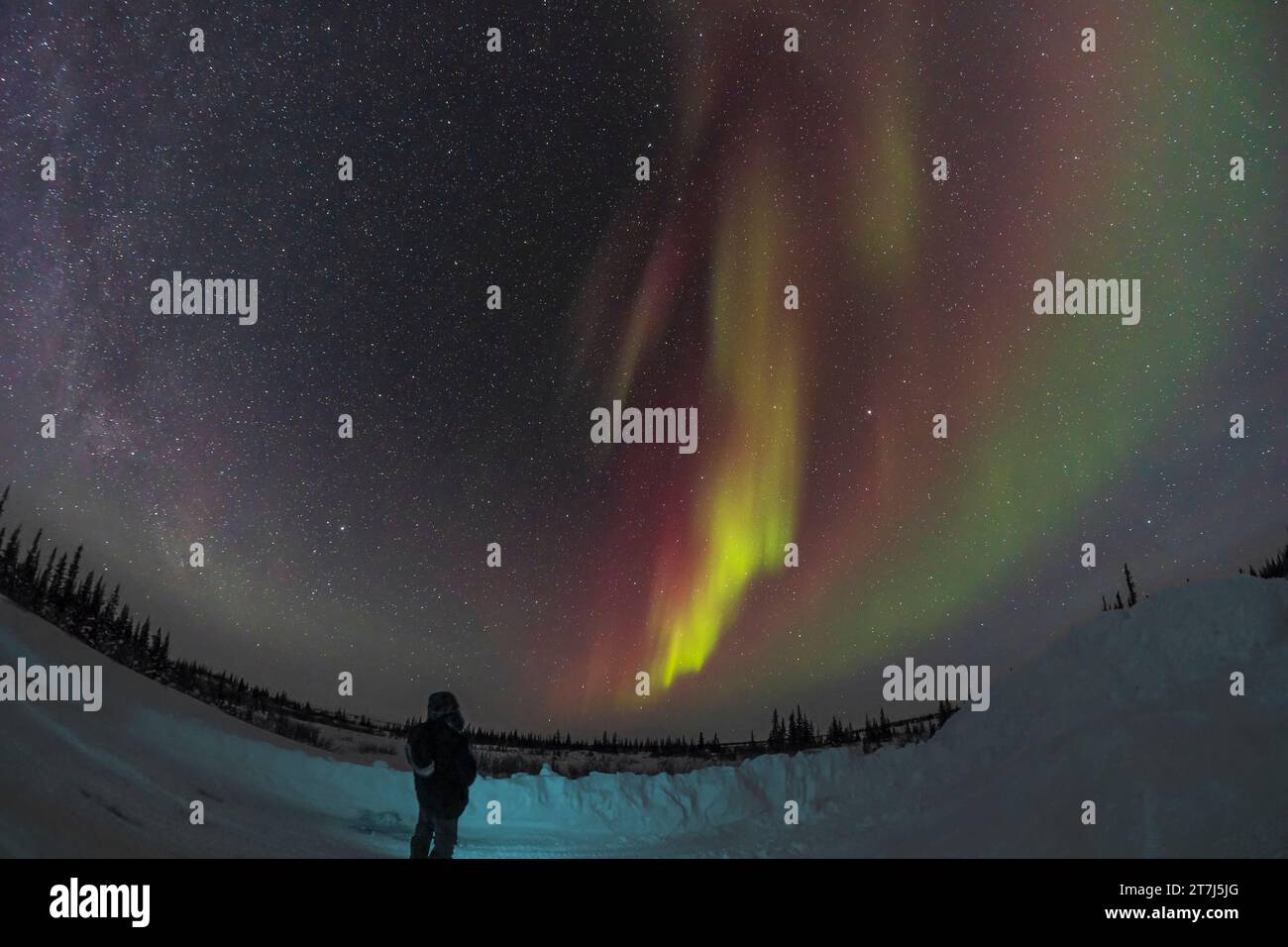 An aurora selfie from the Churchill Northern Studies Centre with faint but colourful arcs to the northeast at this time. This was on February 19, 2023 Stock Photo