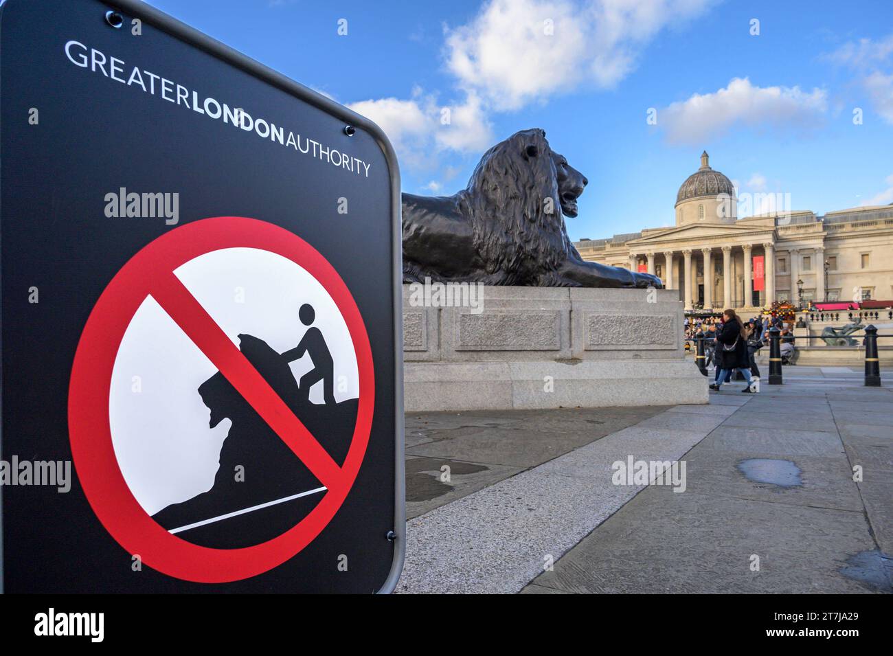 London, UK. Do Not Climb On The Lions sign in Trafalgar Square, at the base of Nelson's Column Stock Photo