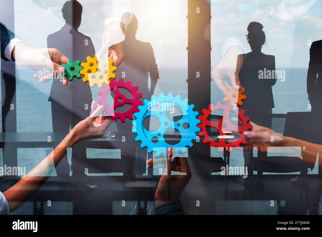 Business team work together and combine pieces of gears. Partnership ...