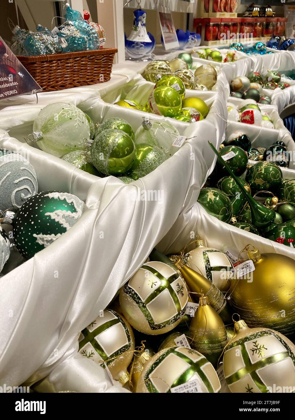 Festive Elegance: A captivating display of green and blue Christmas ornaments, adorning the holiday tree with enchanting hues and seasonal charm Stock Photo