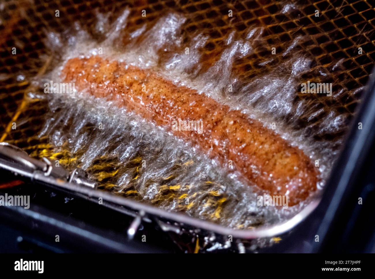 A vegan curry wurst is deep fried in a "Best Worscht in Town" sausage
